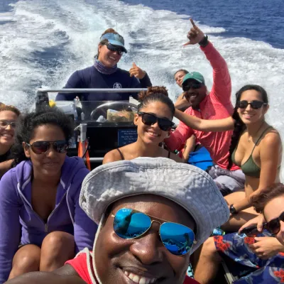 a group of people swimming in a body of water