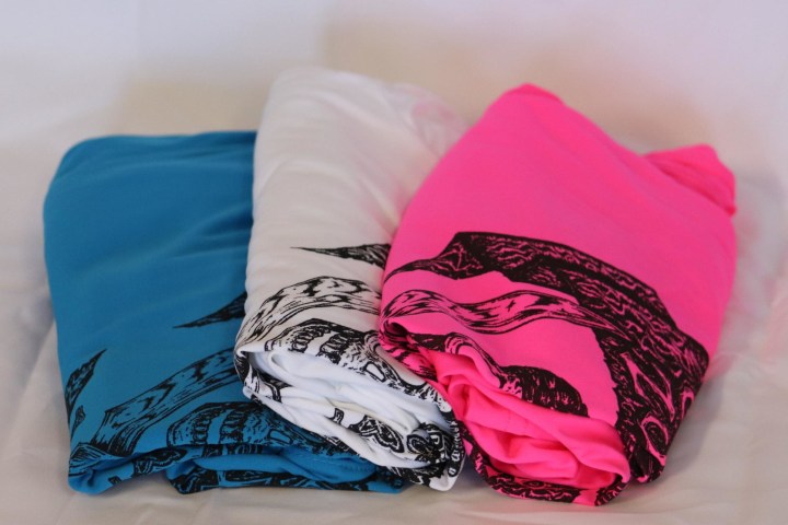 a bag sitting on top of a bed