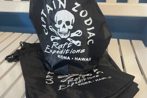 a book sitting on top of a wooden fence